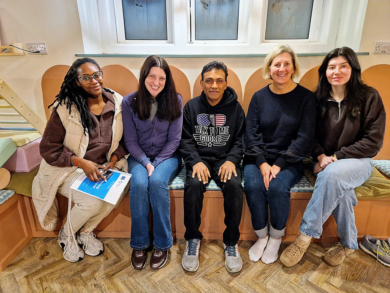 A recent Introducing Mindfulness course group, seated together and smiling after a session in Portsmouth.
